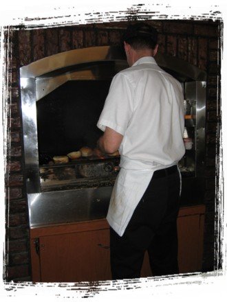 Owner Chuck cooking the famous burgers